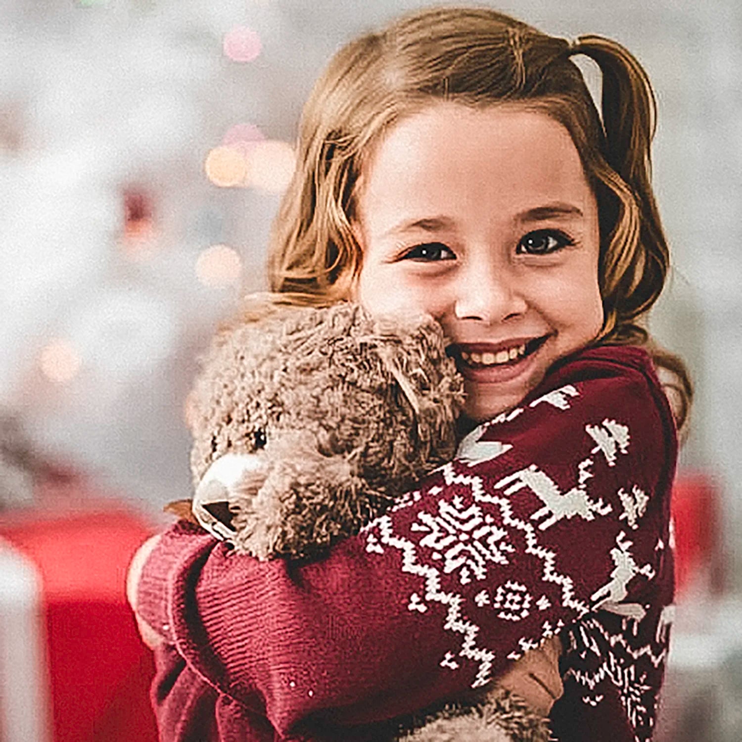 Happy Child with Teddy Bear